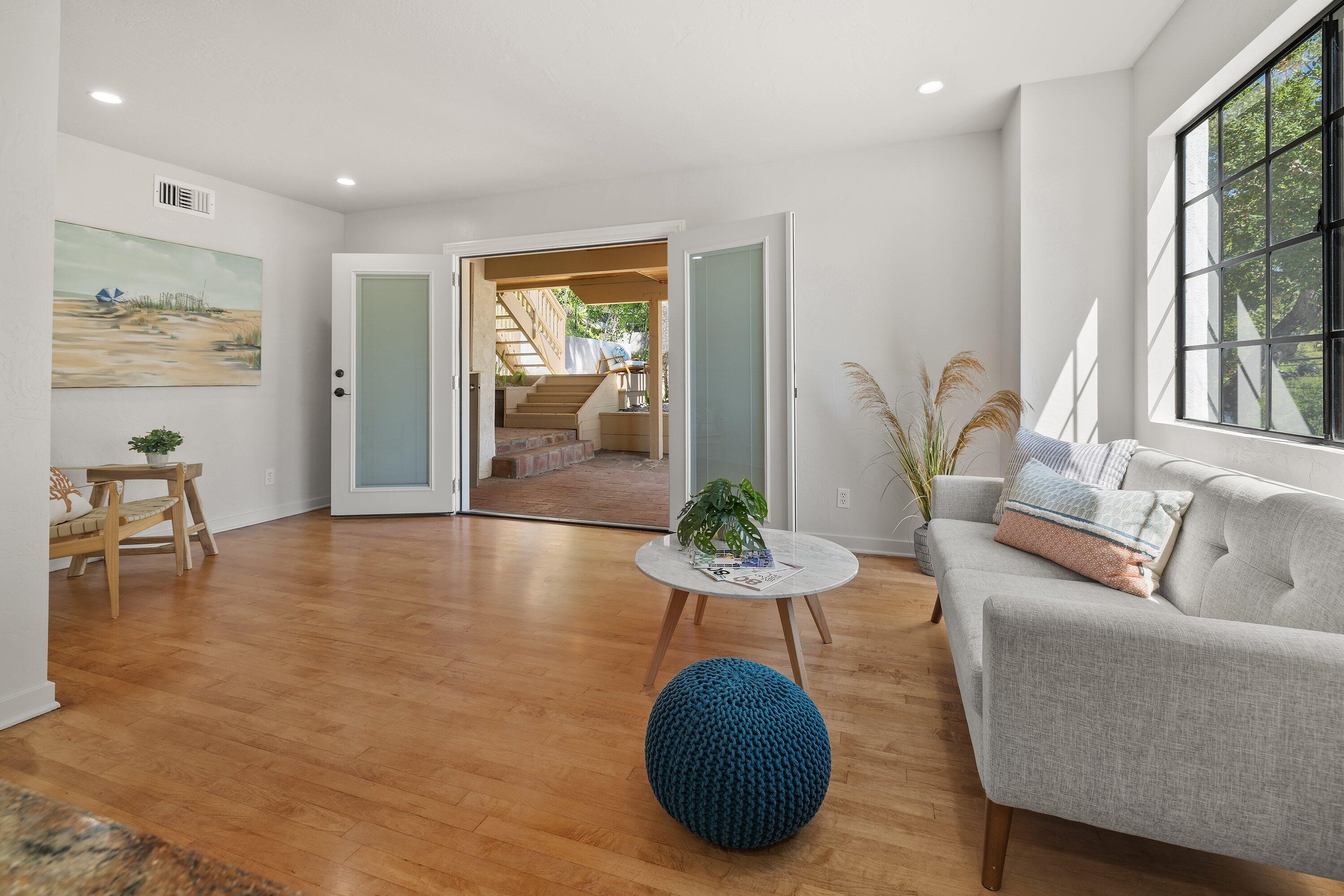 844 Cheltenham Road Santa Barbara, CA 93105 - Photo 12 of 31 a living room with furniture and a large window