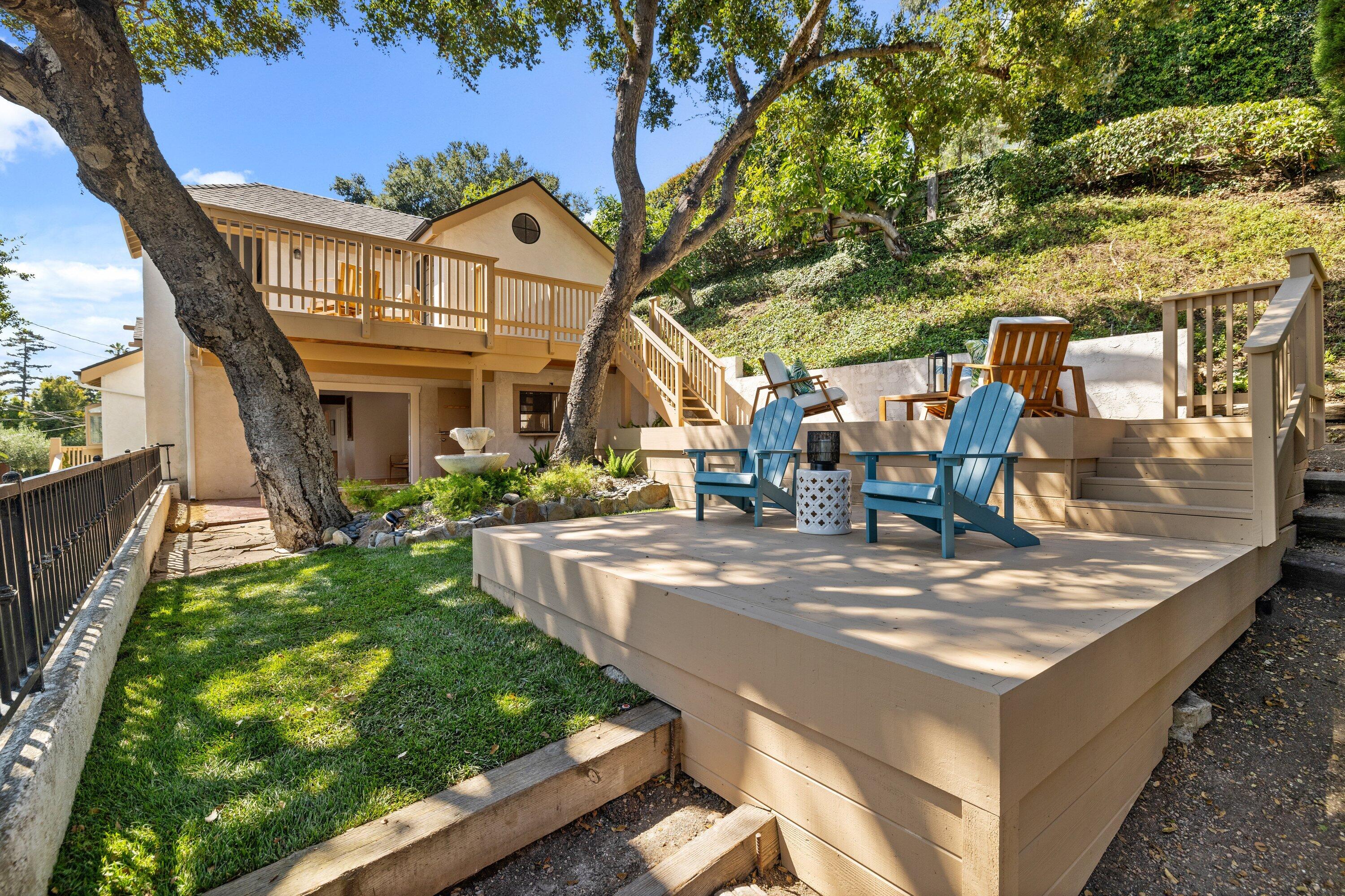 844 Cheltenham Road Santa Barbara, CA 93105 - Photo 16 of 31 a view of an house with backyard porch and sitting area