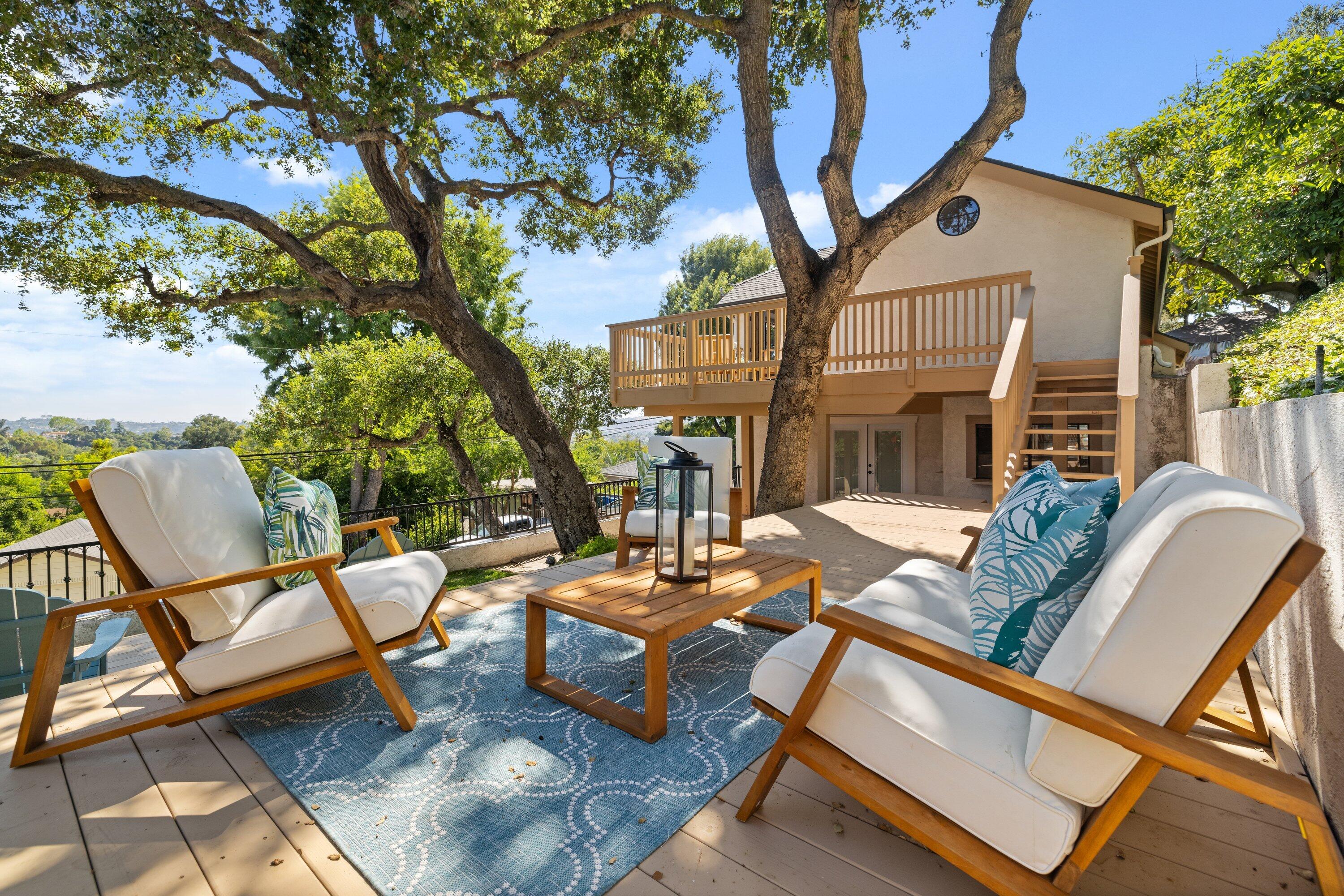 844 Cheltenham Road Santa Barbara, CA 93105 - Photo 17 of 31 a view of a patio with couple of chairs