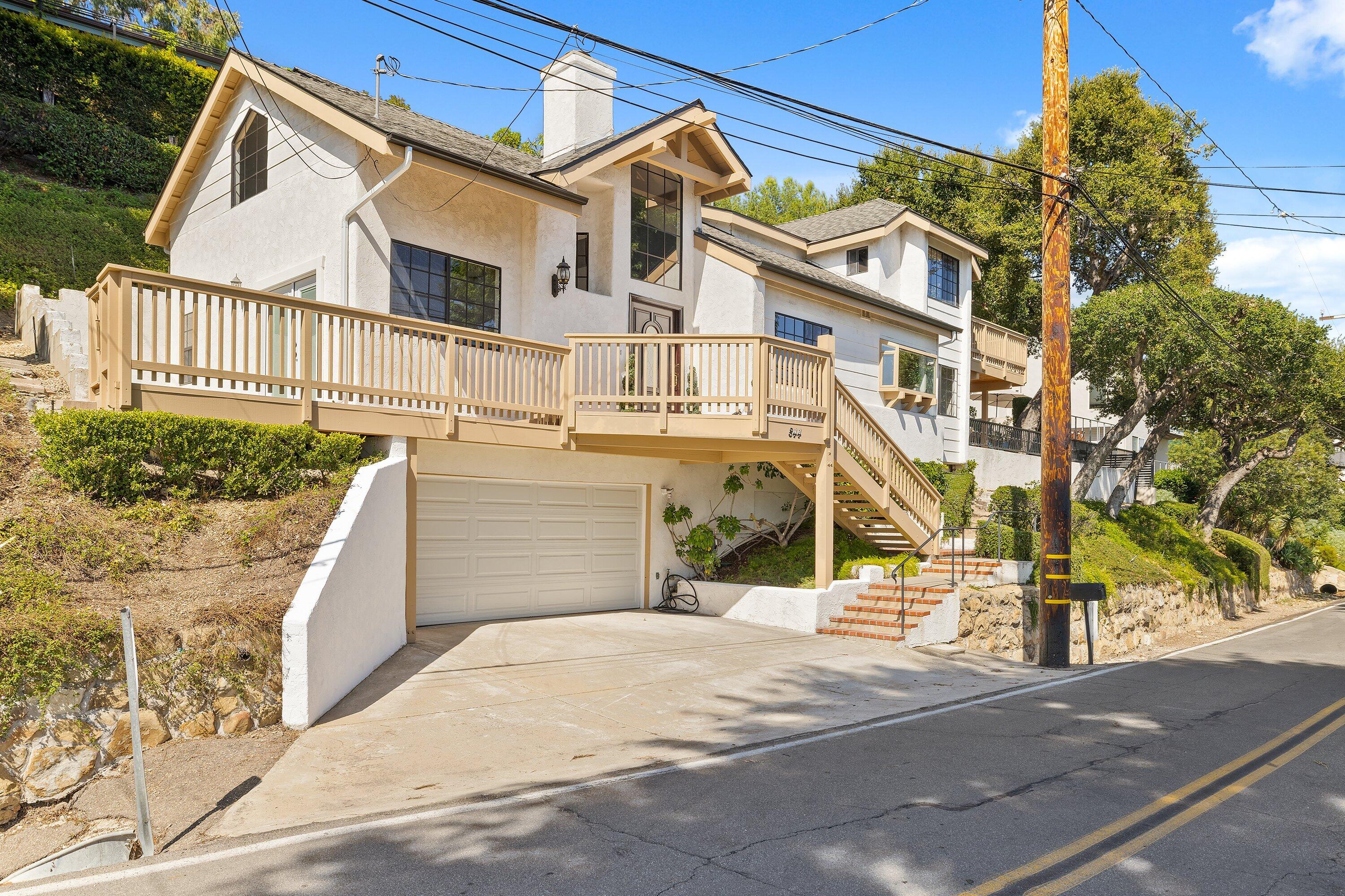 844 Cheltenham Road Santa Barbara, CA 93105 - Photo 2 of 31 a view of a house with a street