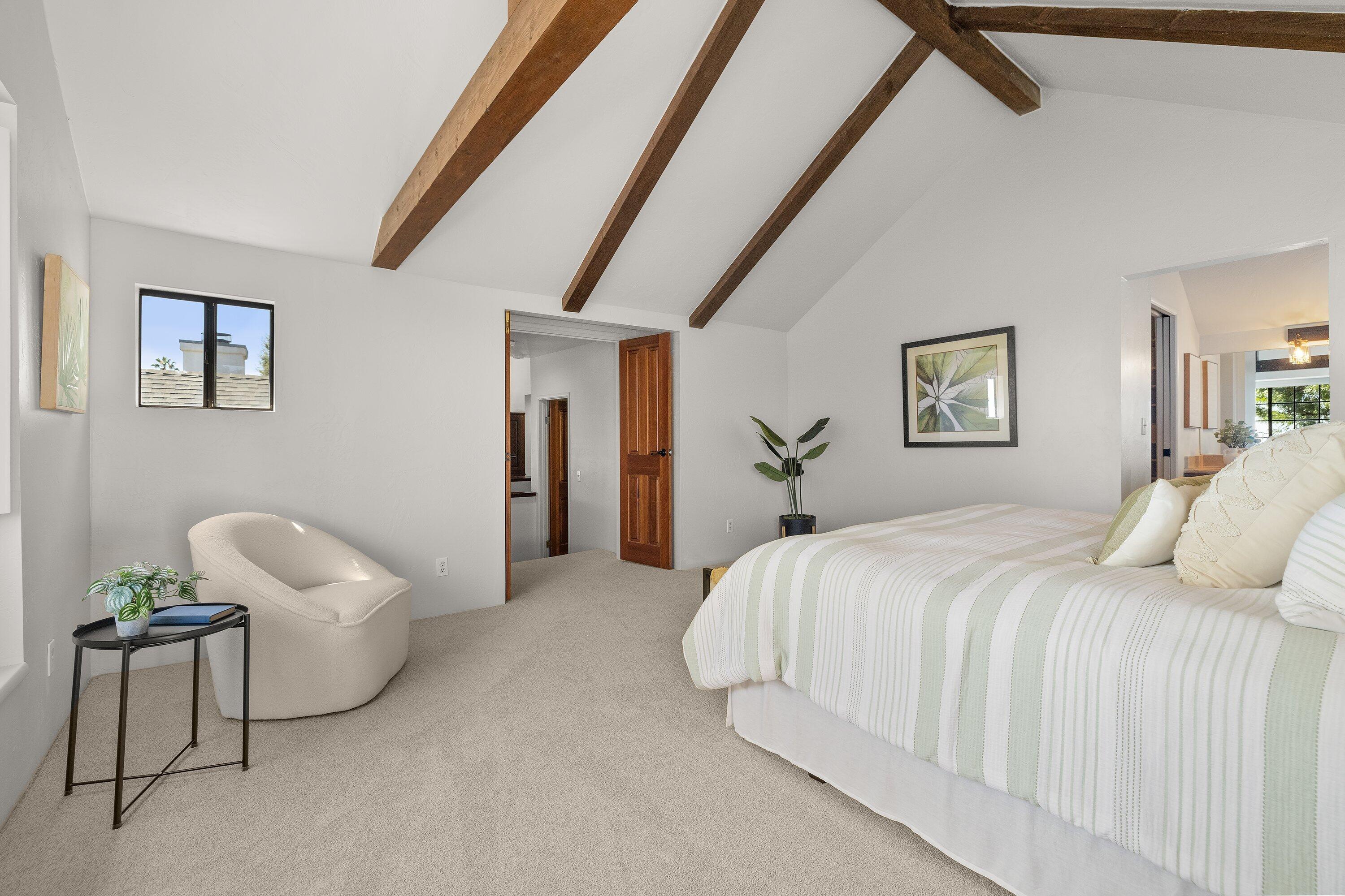 844 Cheltenham Road Santa Barbara, CA 93105 - Photo 21 of 31 a bedroom with a bed and a couch