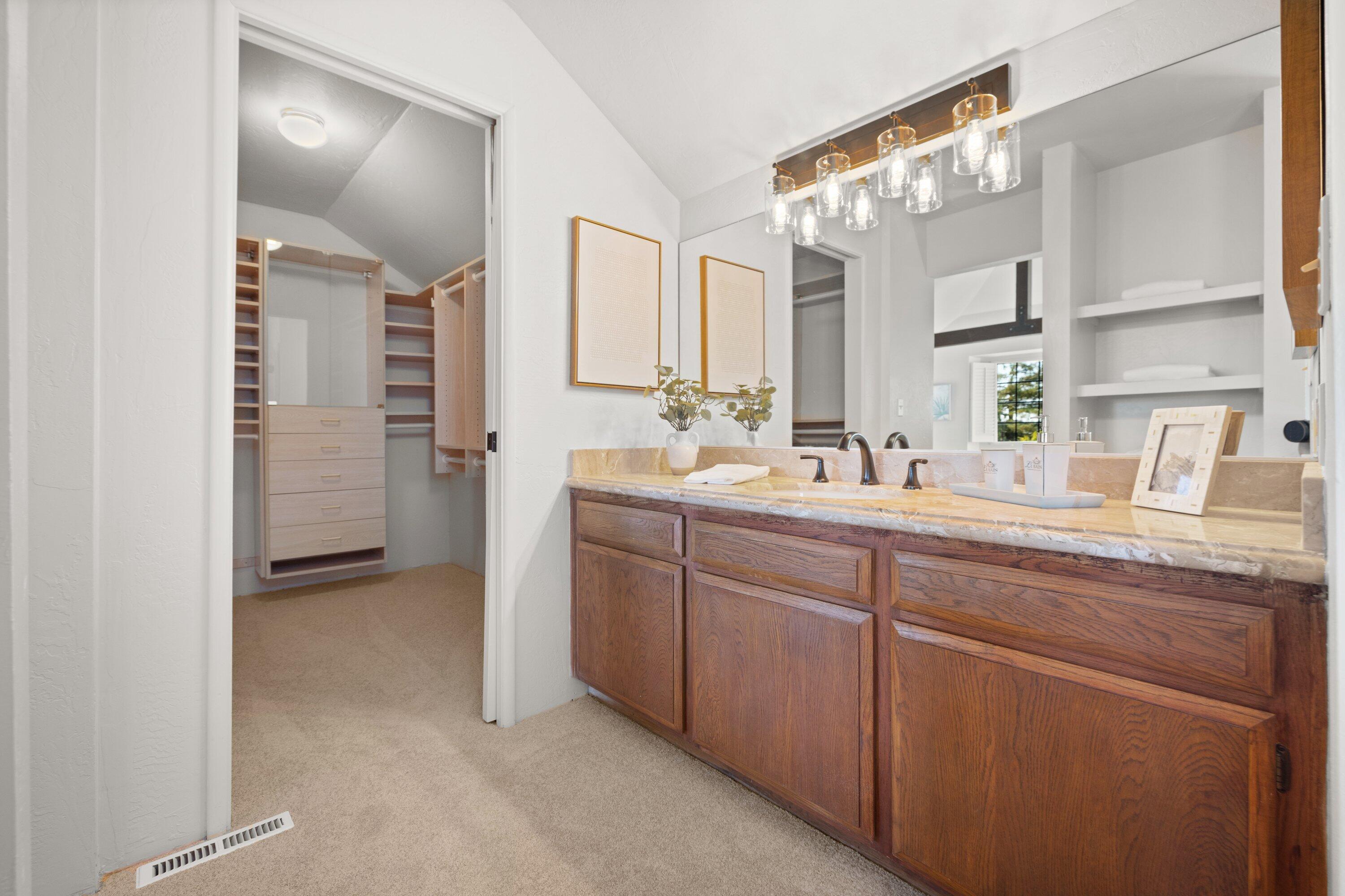 844 Cheltenham Road Santa Barbara, CA 93105 - Photo 24 of 31 a bathroom with a double vanity sink and mirror