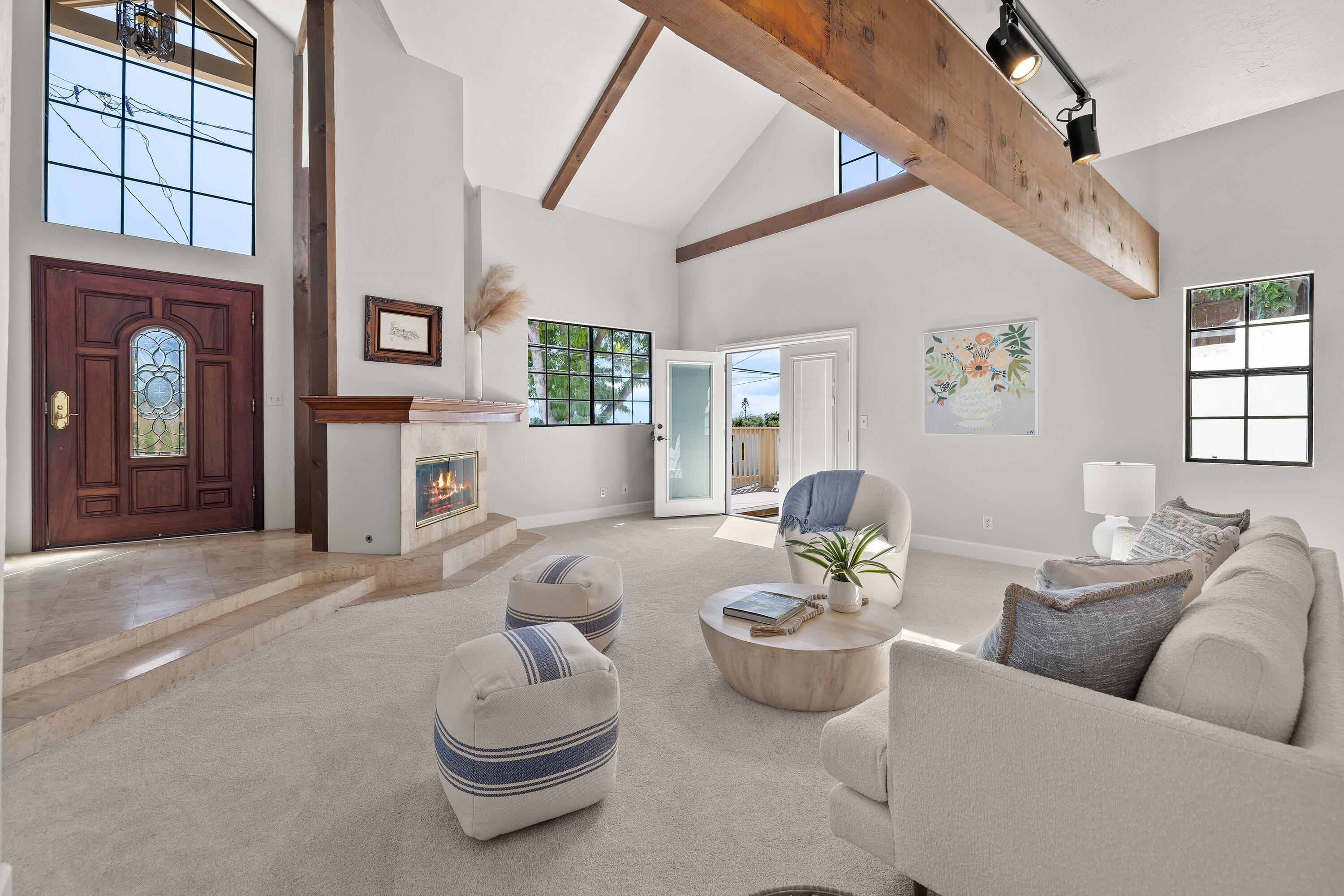 844 Cheltenham Road Santa Barbara, CA 93105 - Photo 4 of 31 a living room with furniture and a large window