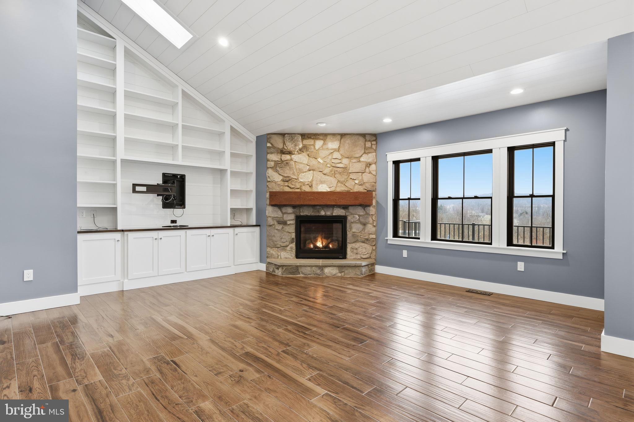 176 Fenstermaker Road Kutztown, PA 19530 - Photo 38 of 149 Spacious living area with cozy fireplace.