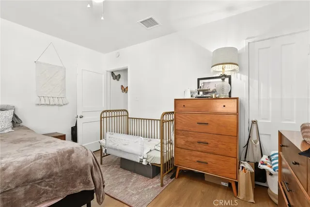 a bathroom with a sink a mirror and a shower curtain