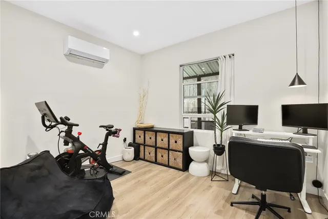 a bathroom with a sink toilet and mirror