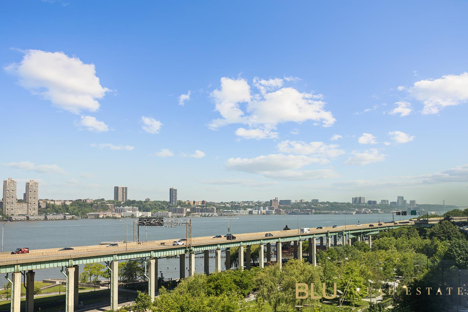 220 Riverside Boulevard, Unit 15M Manhattan, NY 10069 - Photo 8 of 11 a view of a city with lots of buildings in the background