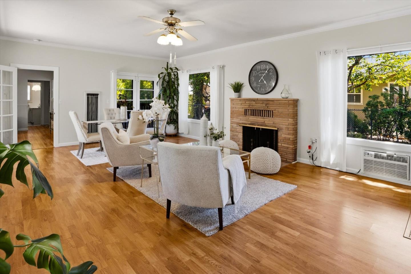 16899 Kennedy Road Los Gatos, CA 95032 - Photo 3 of 61 a living room with furniture and a fireplace