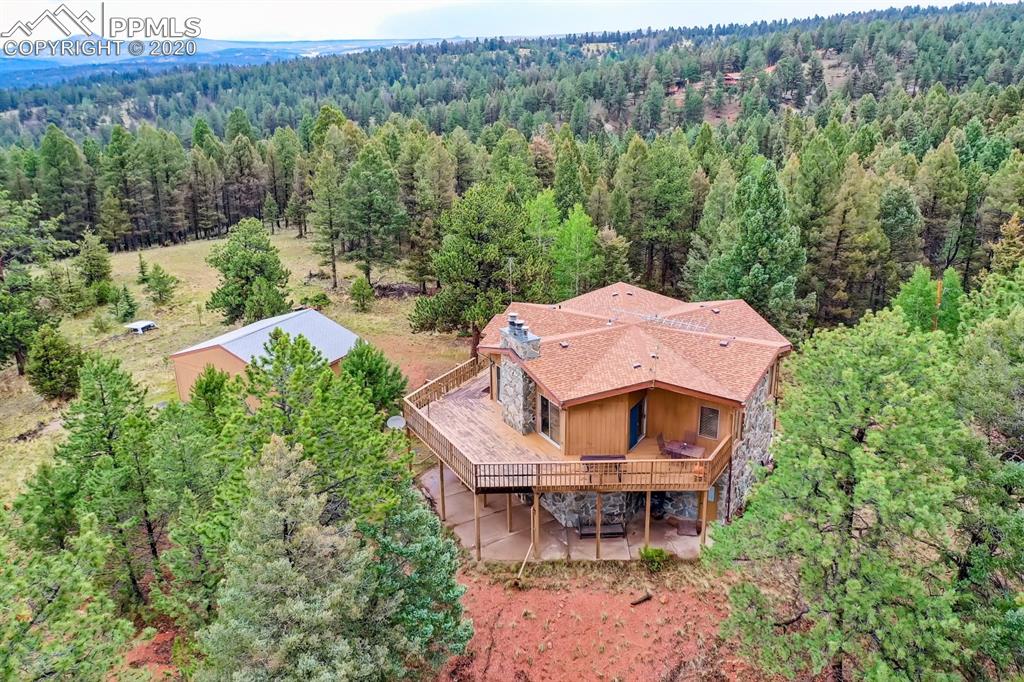 247 Pinewood Road Florissant, CO 80816 - Photo 38 of 39 an aerial view of a house with a yard