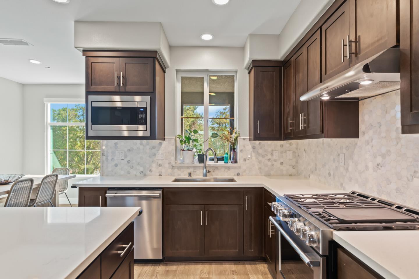 202 Malley Way Campbell, CA 95008 - Photo 16 of 29 a kitchen with a sink stove and microwave