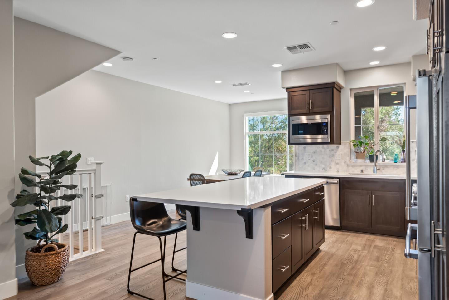 202 Malley Way Campbell, CA 95008 - Photo 17 of 29 a kitchen with stainless steel appliances granite countertop a sink a stove and a refrigerator