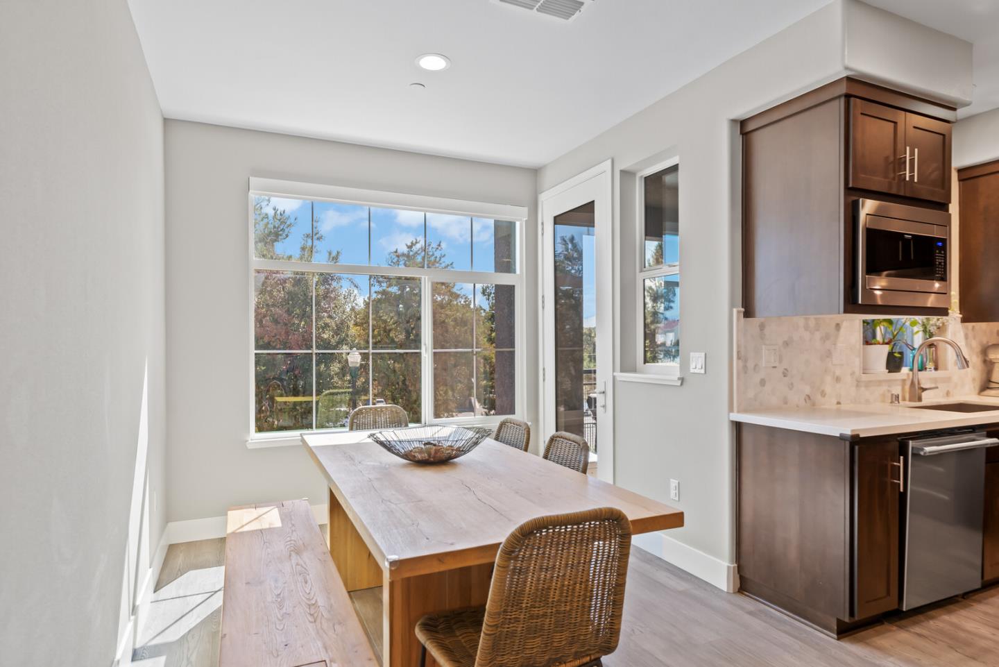 202 Malley Way Campbell, CA 95008 - Photo 19 of 29 a dining room with a table and chairs