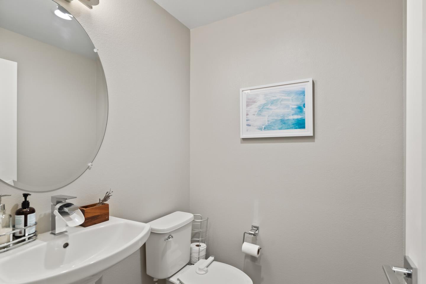 202 Malley Way Campbell, CA 95008 - Photo 26 of 29 a white toilet sitting next to a bathroom sink