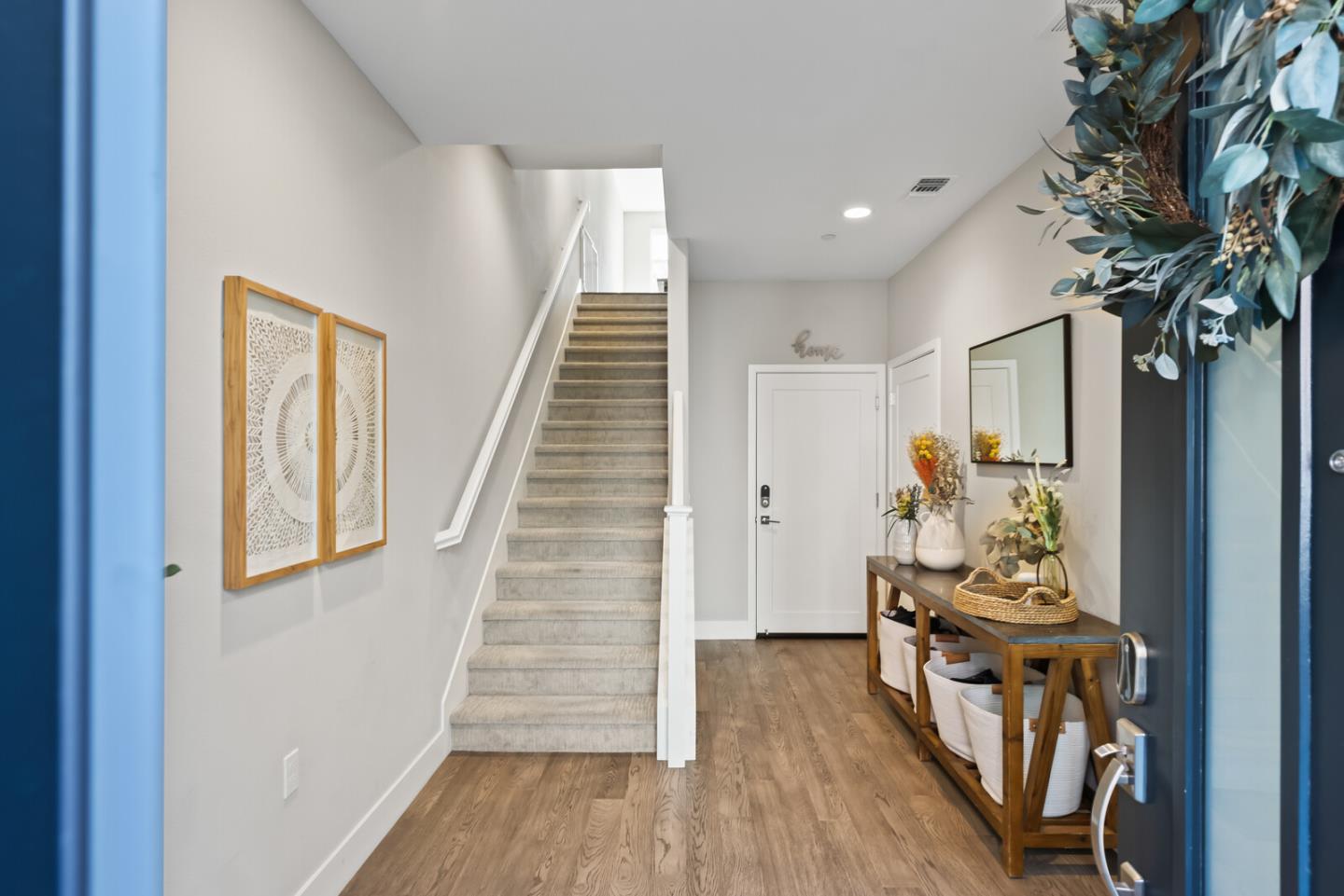 202 Malley Way Campbell, CA 95008 - Photo 4 of 29 a view of a hallway with wooden floor and stairs