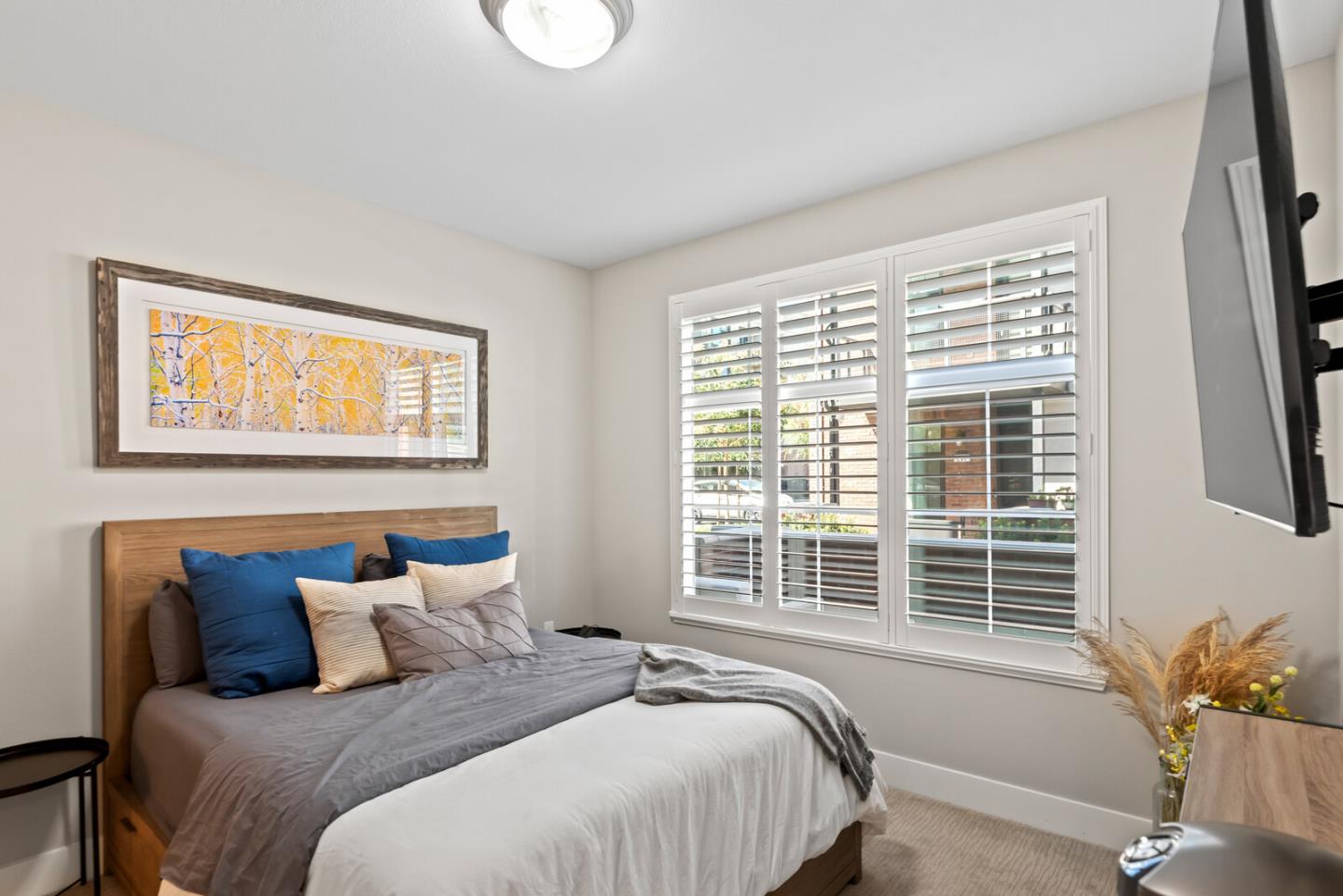 202 Malley Way Campbell, CA 95008 - Photo 5 of 29 a bedroom with a bed and wooden floor