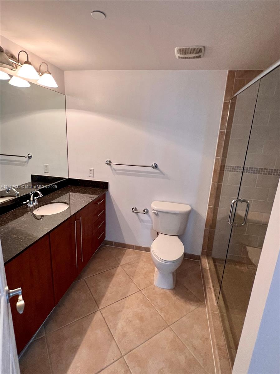 Kendall Miami, FL 33156 - Photo 20 of 22 a bathroom with a sink toilet and shower