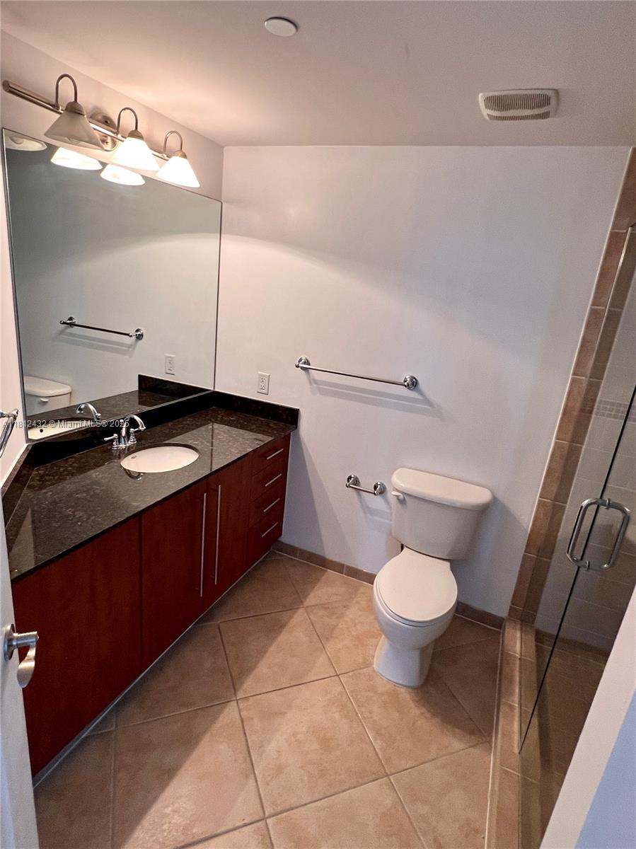 Kendall Miami, FL 33156 - Photo 5 of 22 a bathroom with a sink and a toilet