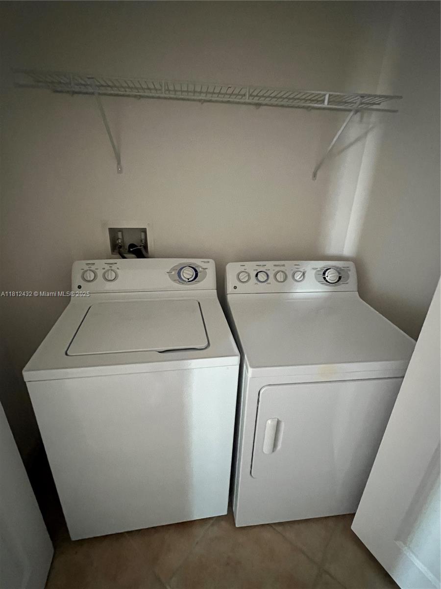 Kendall Miami, FL 33156 - Photo 7 of 22 a utility room with dryer and washer