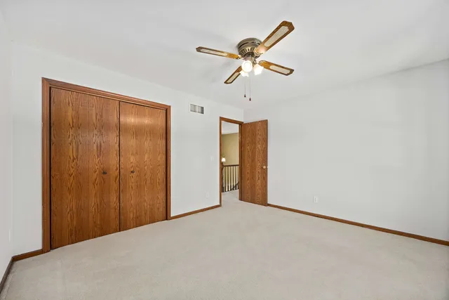 a view of a livingroom with a fan