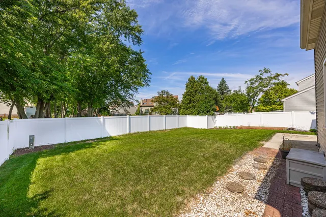 a view of a backyard with a small cabin