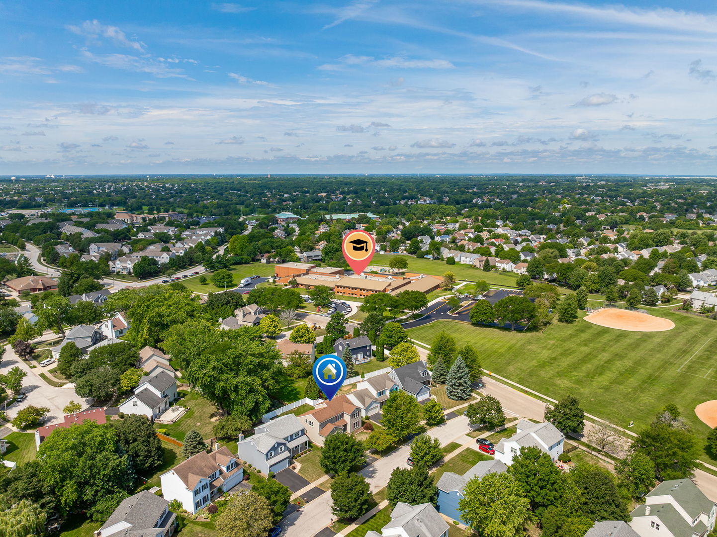 703 Avondale Lane Aurora, IL 60504 - Photo 40 of 40 an aerial view of residential houses with outdoor space