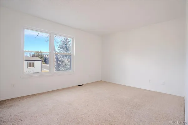 an empty room with a window