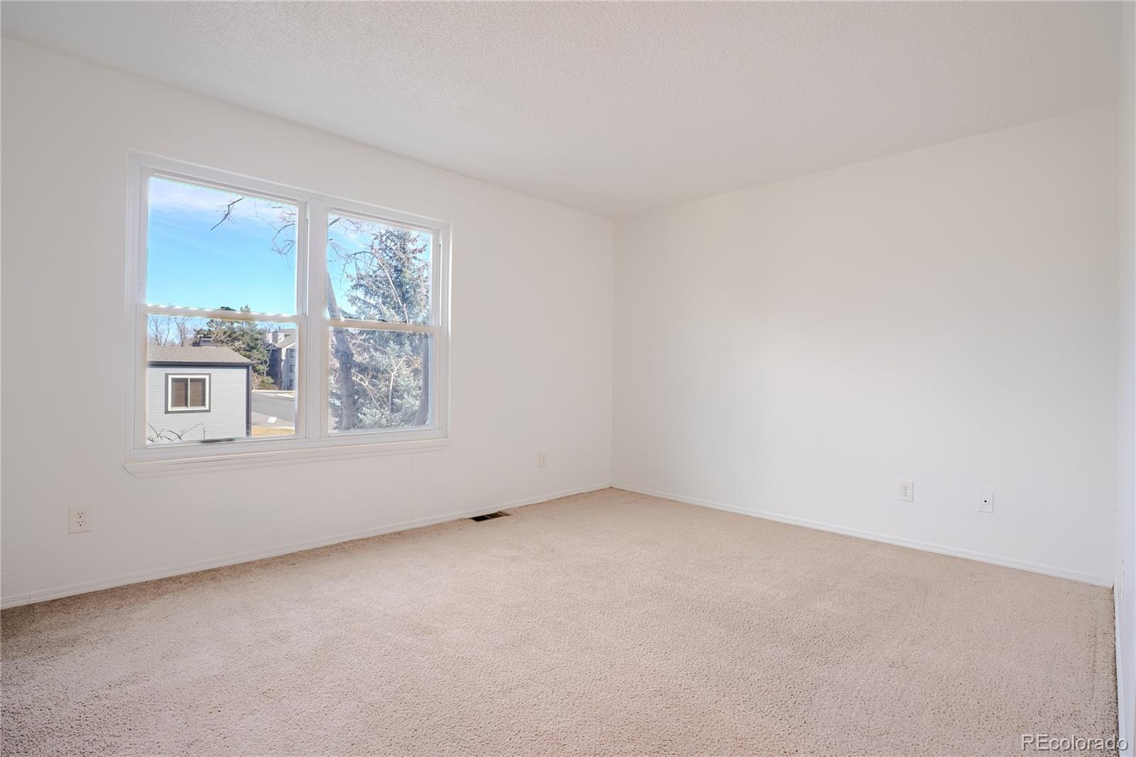 6315 Oak Street, Unit 2 Arvada, CO 80004 - Photo 19 of 34 an empty room with a window