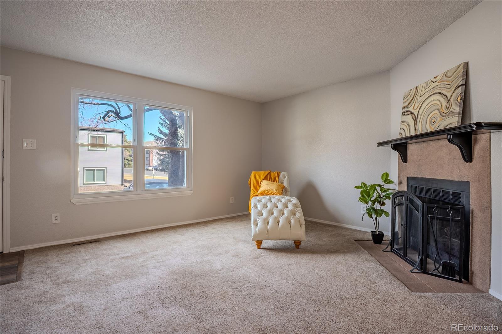 6315 Oak Street, Unit 2 Arvada, CO 80004 - Photo 3 of 34 a view of livingroom with furniture and entryway