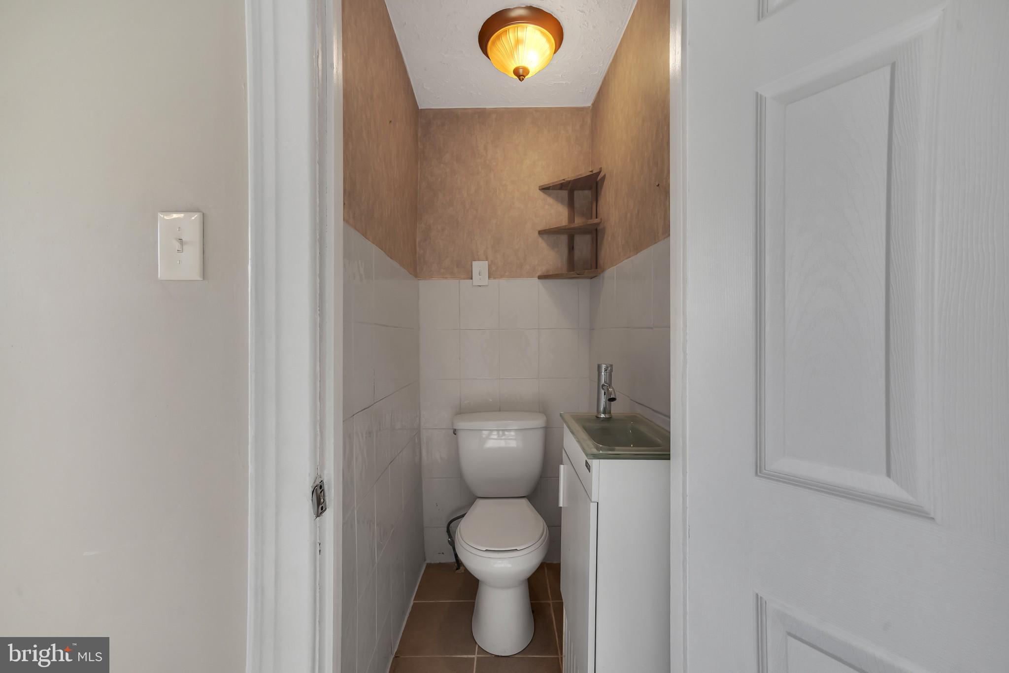 5642 Gainor Road Philadelphia, PA 19131 - Photo 10 of 23 Half Bath - main level