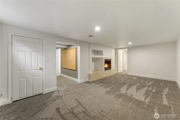 a living room with a fireplace