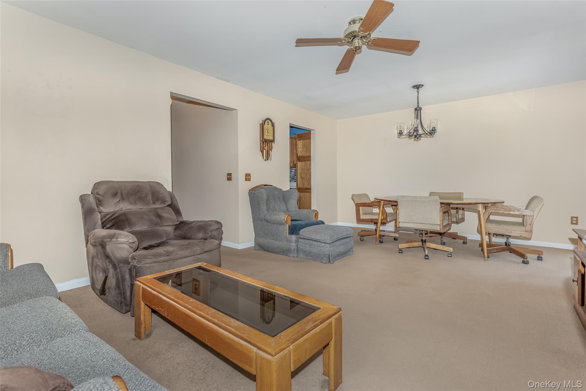 57 Winding Brook Drive Walden, NY 12586 - Photo 13 of 33 a living room with furniture and a couch