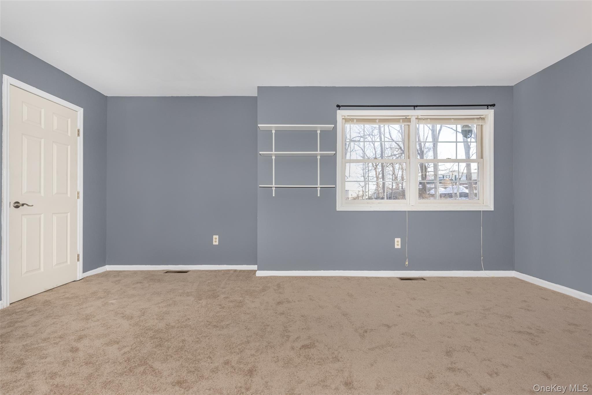 57 Winding Brook Drive Walden, NY 12586 - Photo 26 of 33 a view of an empty room with a window