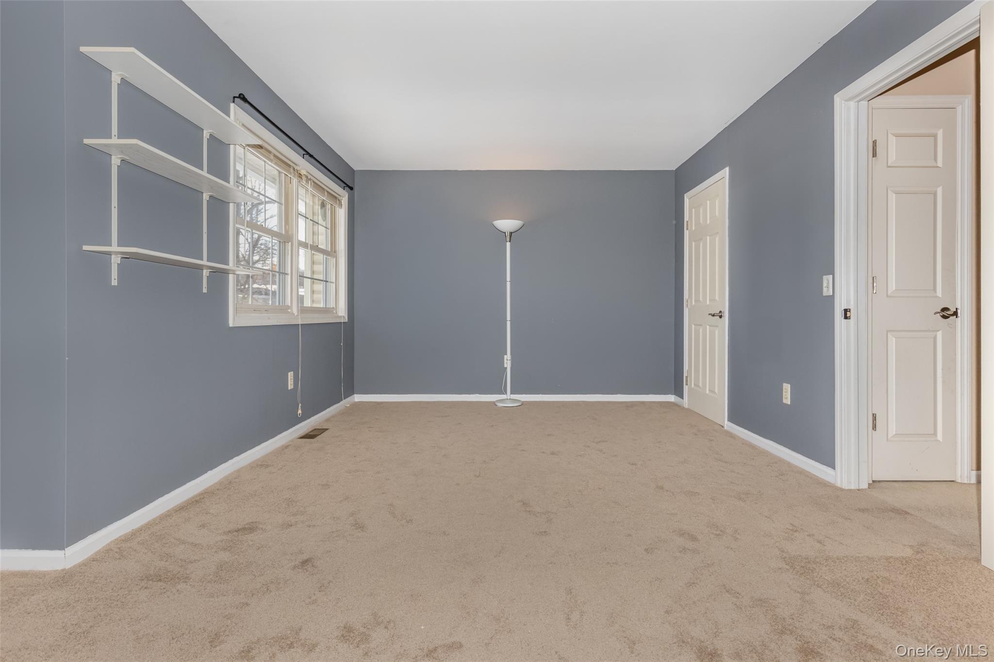 57 Winding Brook Drive Walden, NY 12586 - Photo 29 of 33 a view of an empty room with a window