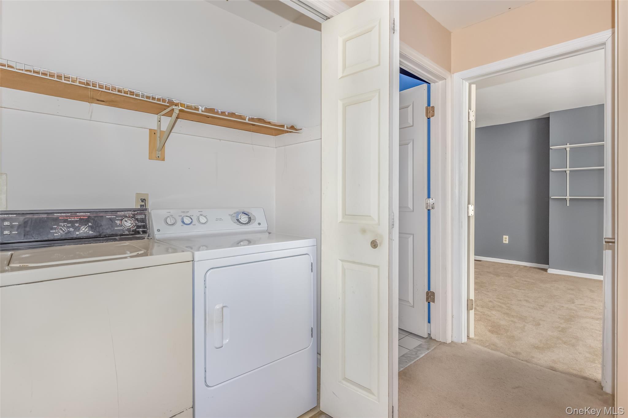 57 Winding Brook Drive Walden, NY 12586 - Photo 33 of 33 a utility room with dryer and washer