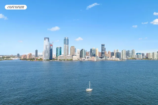 a view of a city with tall buildings in the background