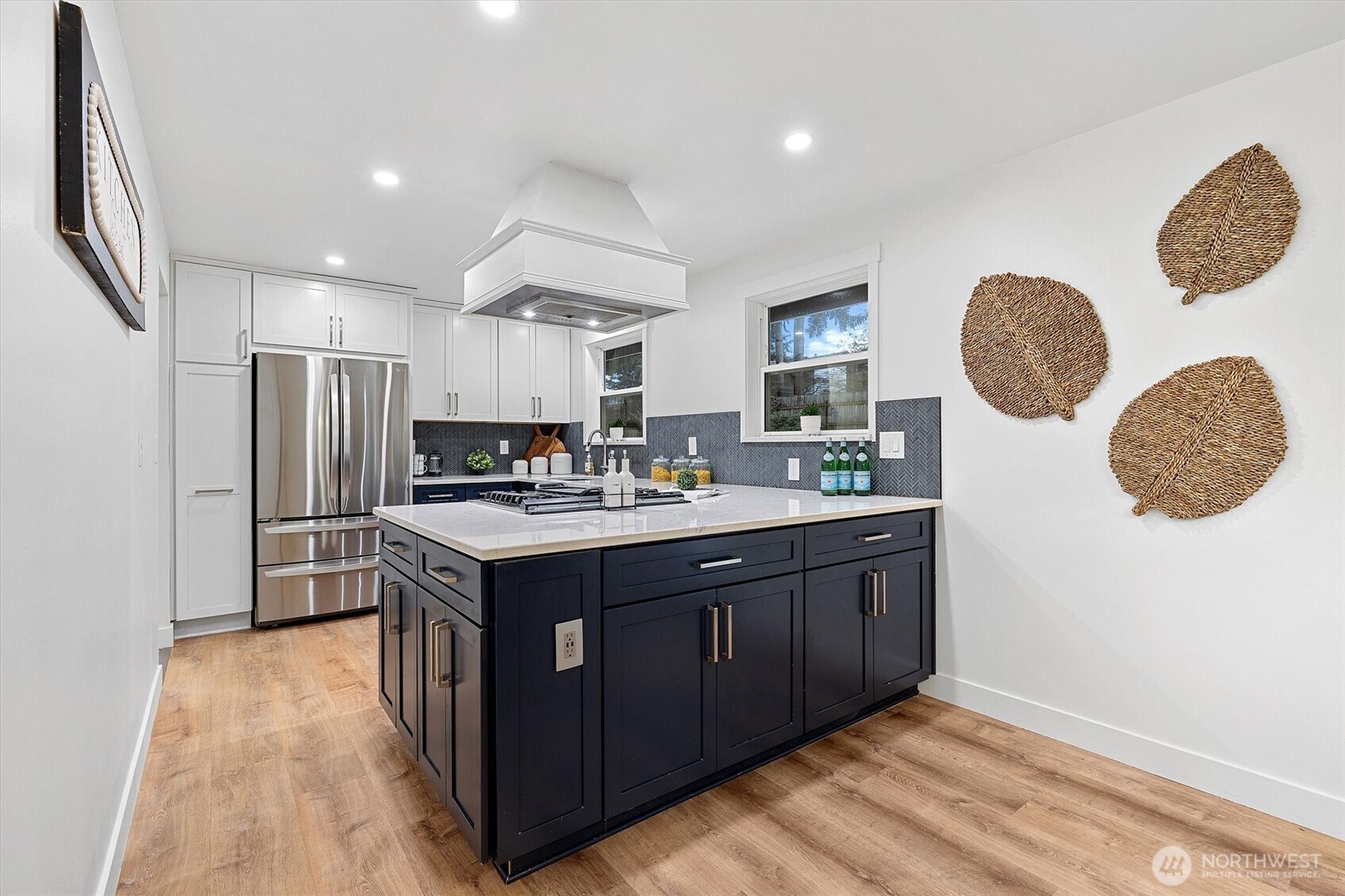 9218 Northeast 184th Place Bothell, WA 98011 - Photo 12 of 37 a kitchen with a sink cabinets and stainless steel appliances
