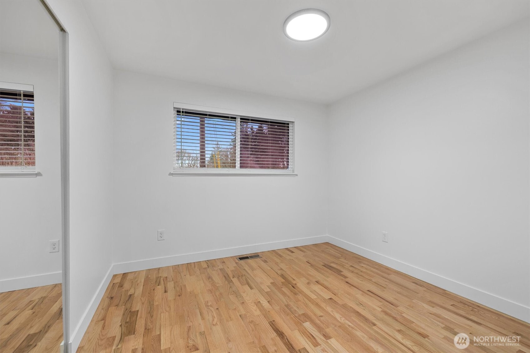 9218 Northeast 184th Place Bothell, WA 98011 - Photo 21 of 37 wooden floor in a room