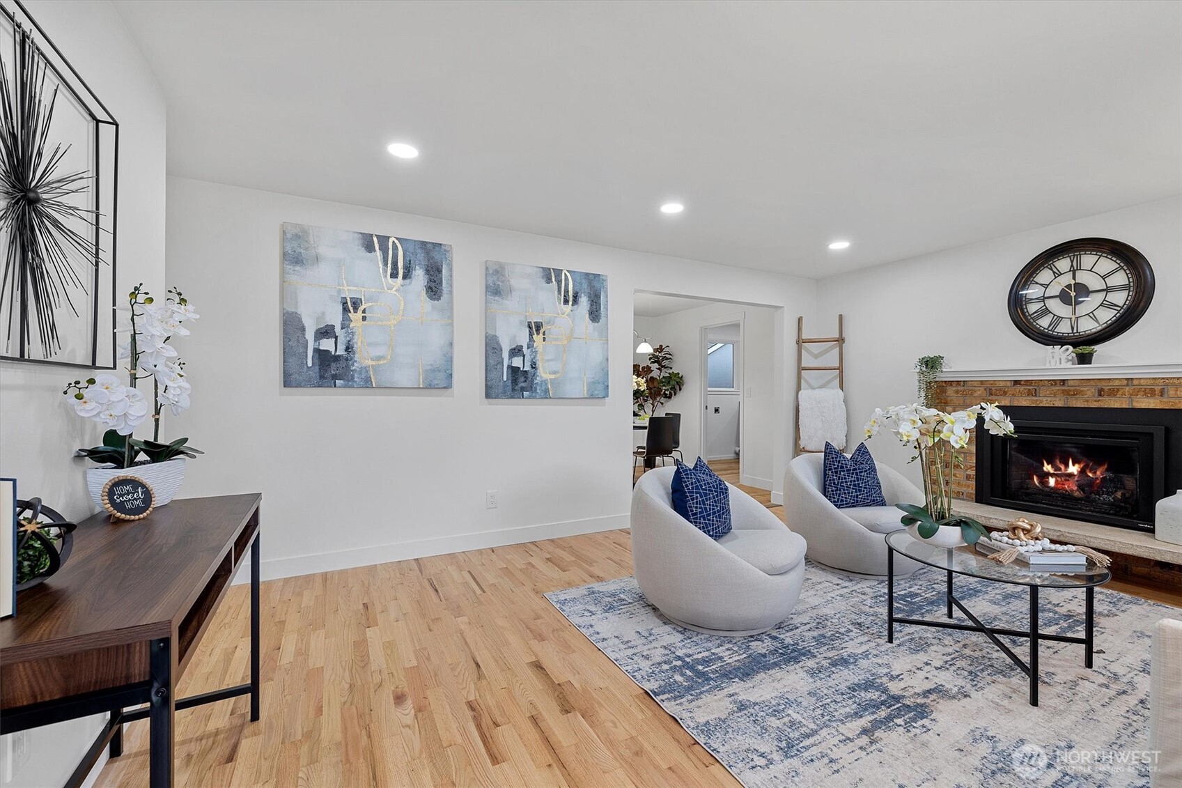 9218 Northeast 184th Place Bothell, WA 98011 - Photo 3 of 37 a living room with furniture and a fireplace
