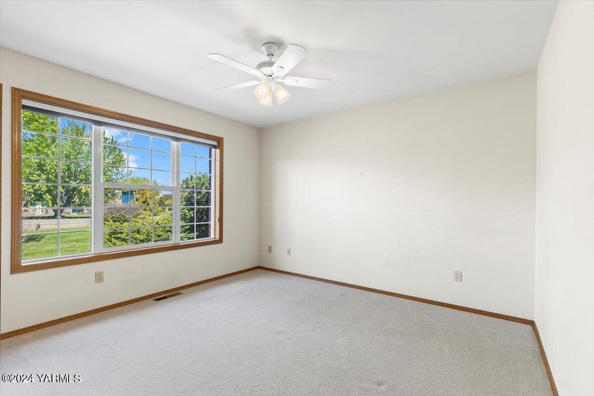 11810 West Barrett Road Yakima, WA 98908 - Photo 13 of 47 wooden floor in an empty room with a window