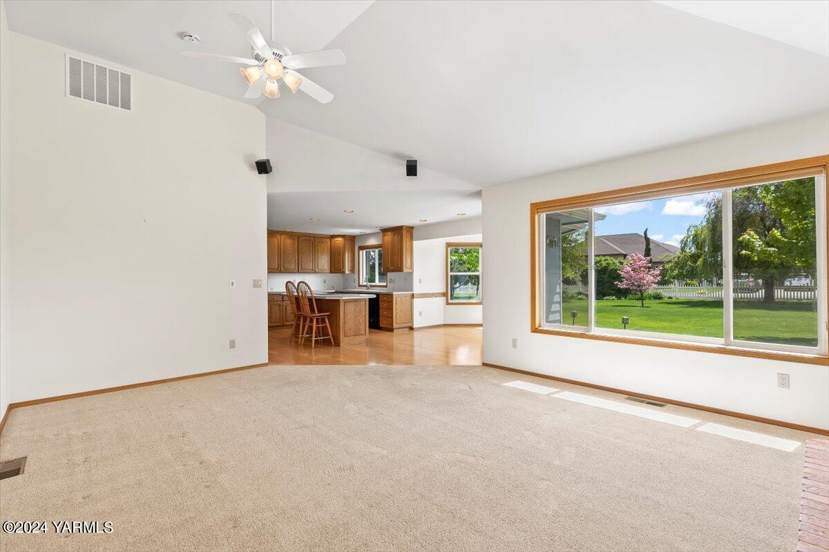 11810 West Barrett Road Yakima, WA 98908 - Photo 31 of 47 a view of a livingroom with a ceiling fan and a large window