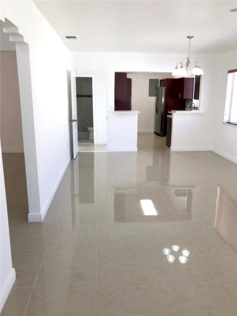 540 Beacom Boulevard Miami, FL 33135 - Photo 1 of 27 a bathroom with a sink and mirror