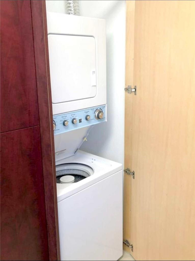 540 Beacom Boulevard Miami, FL 33135 - Photo 15 of 27 a bathroom with a sink and a washing machine
