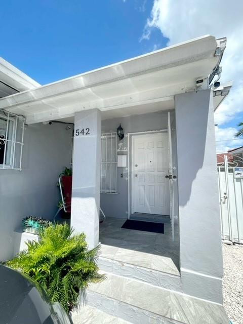 540 Beacom Boulevard Miami, FL 33135 - Photo 16 of 27 a front view of a house with a potted plant