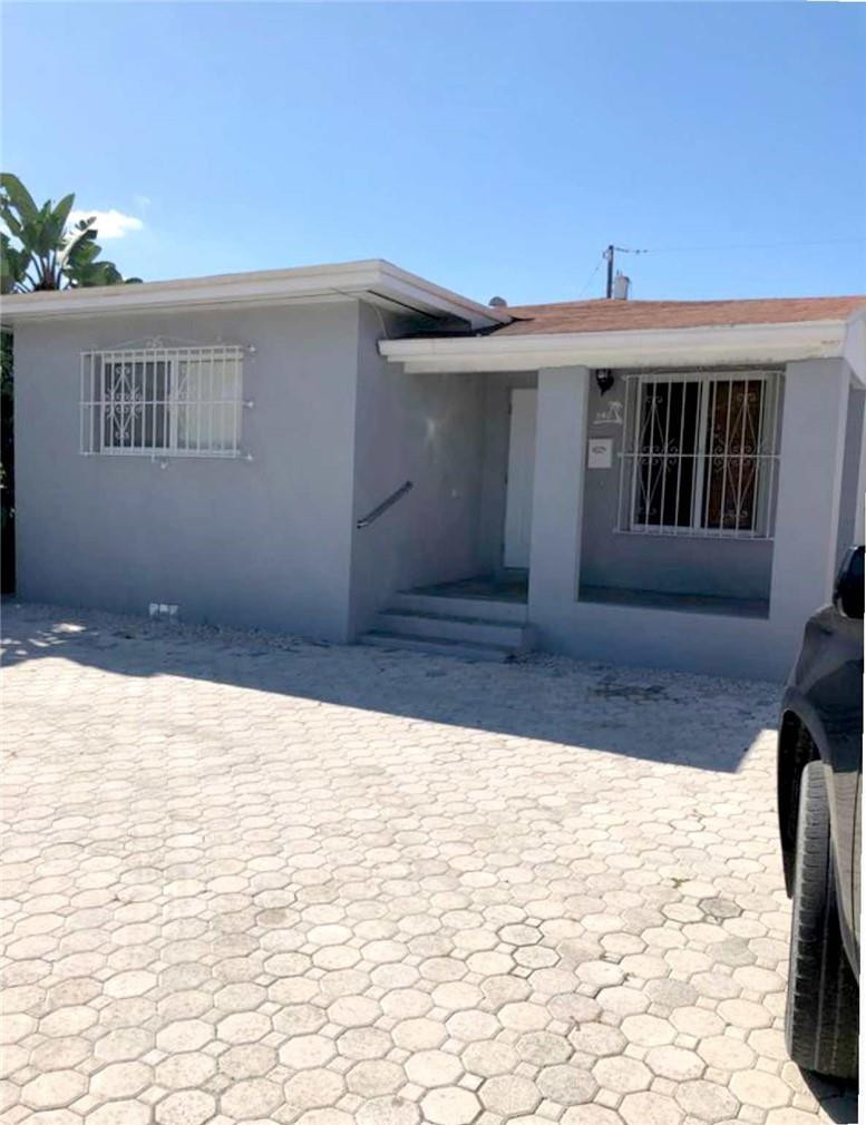 540 Beacom Boulevard Miami, FL 33135 - Photo 26 of 27 a view of house with backyard and sitting area
