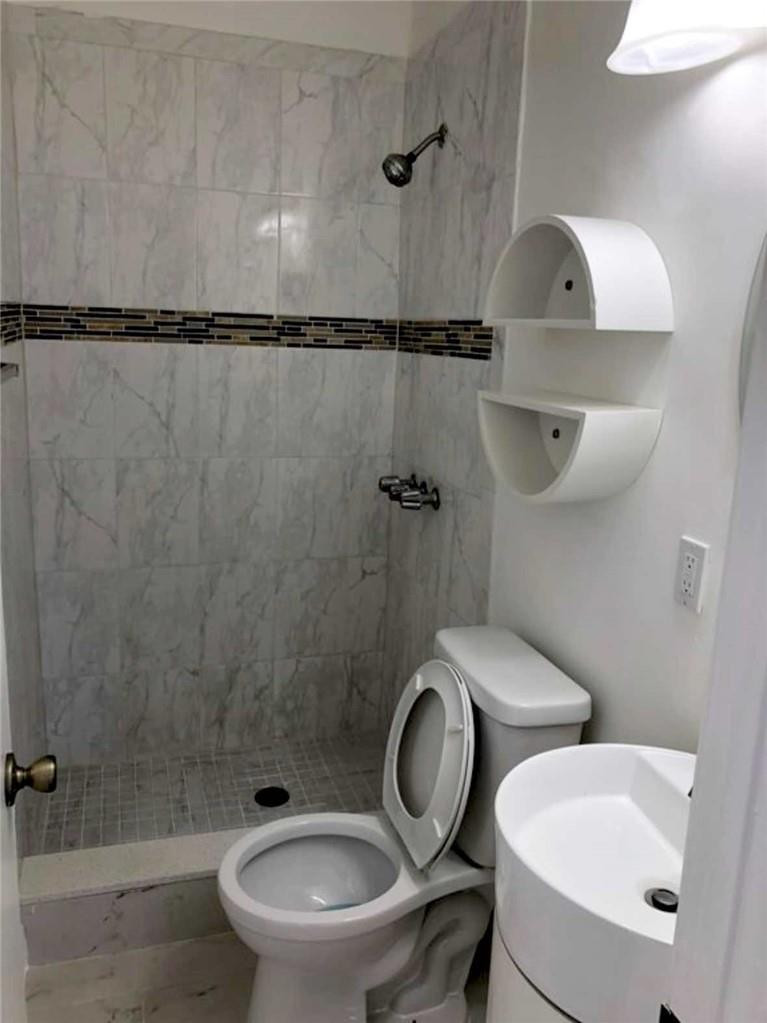 540 Beacom Boulevard Miami, FL 33135 - Photo 6 of 27 a bathroom with a toilet and a shower