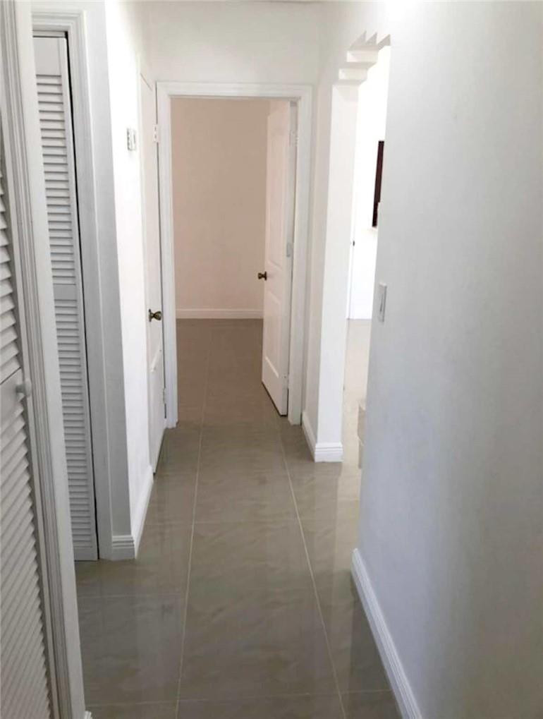 540 Beacom Boulevard Miami, FL 33135 - Photo 8 of 27 a view of hallway with closet