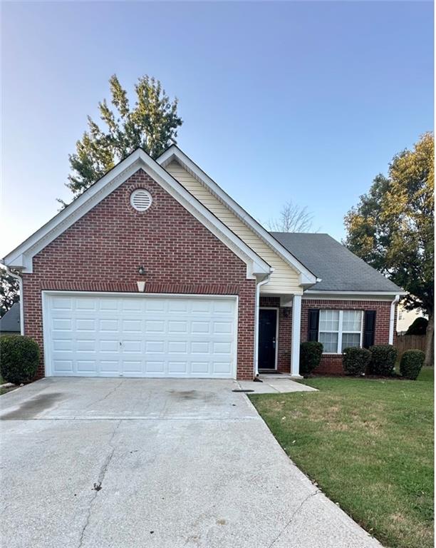 4194 Wesley Hall Lane Decatur, GA 30035 - Photo 1 of 1 a house view with a garden space
