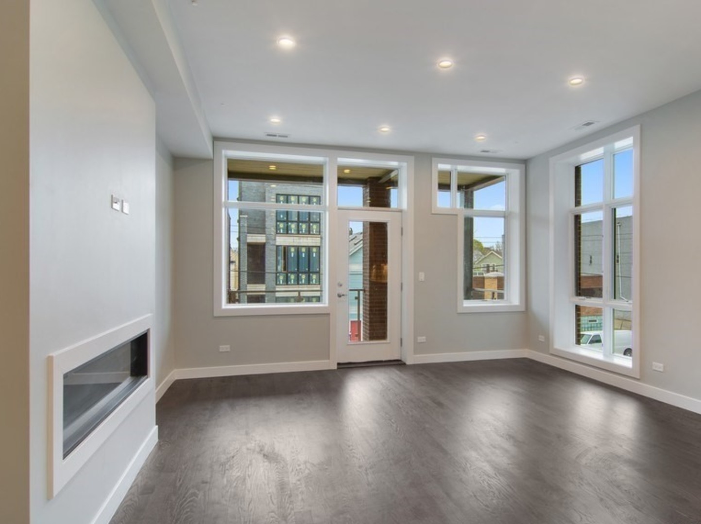 2448-50 North Clybourn Avenue Chicago, IL 60614 - Photo 2 of 10 an empty room with wooden floor and windows