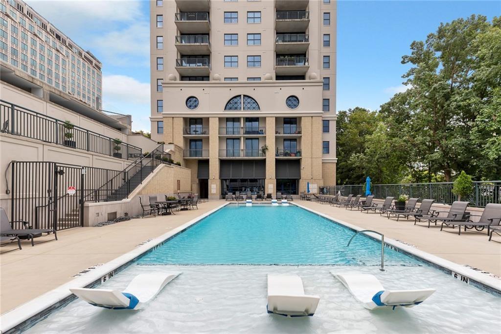 3040 Peachtree Road Northwest, Unit 704 Atlanta, GA 30305 - Photo 15 of 16 a view of building with outdoor space