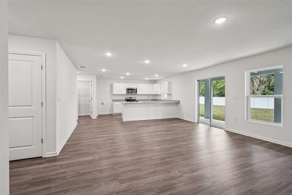 2155 Northwest 23rd Loop Ocala, FL 34475 - Photo 12 of 24 a view of kitchen with wooden floor